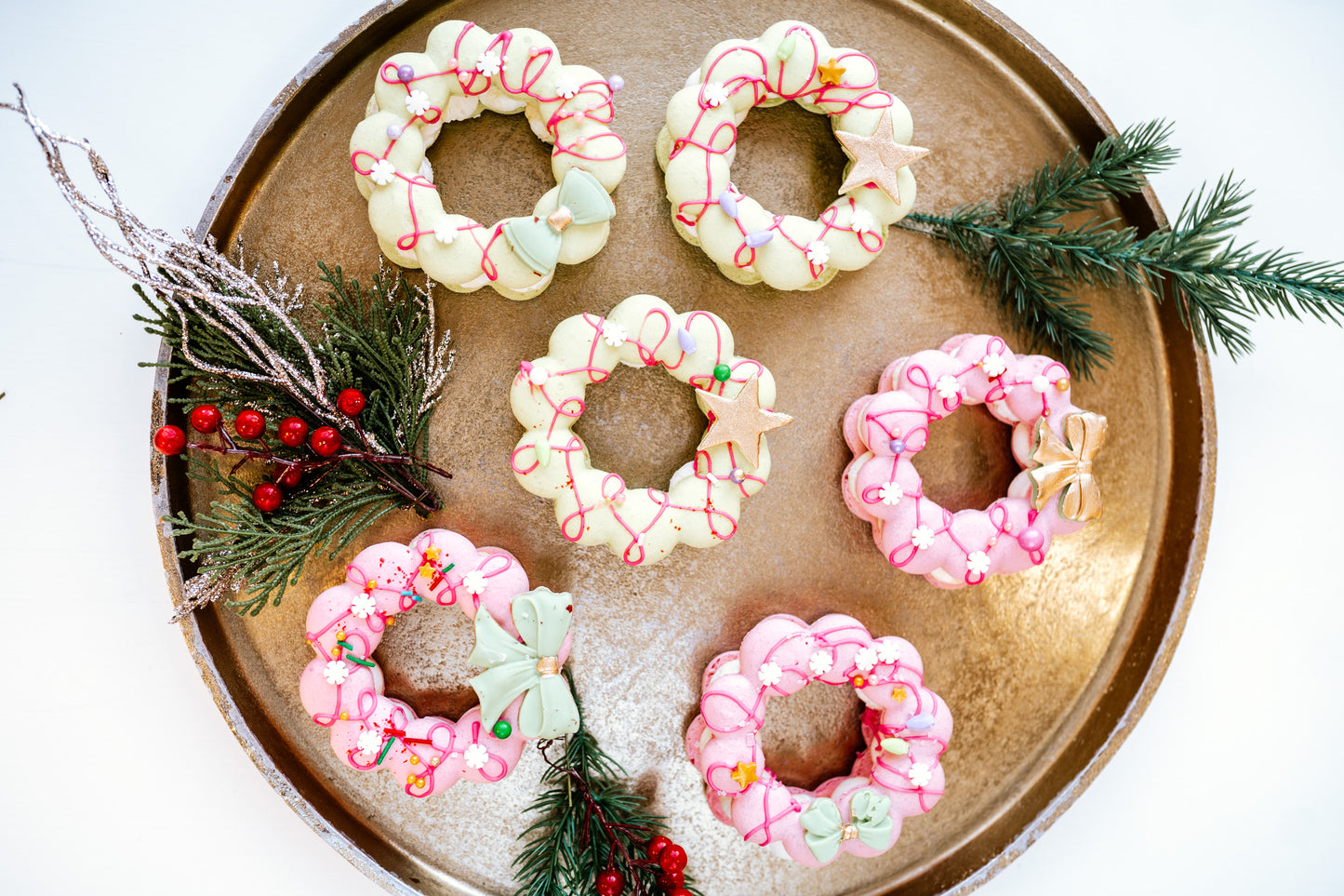 Macaron wreath filled with a French buttercream and raspberry compote.(12)